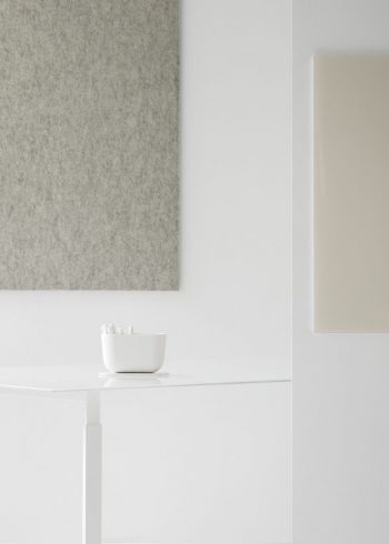 CHAT BOARD Storage Unit in White shown on table with BuzziFelt in Off White and Classic in Nude