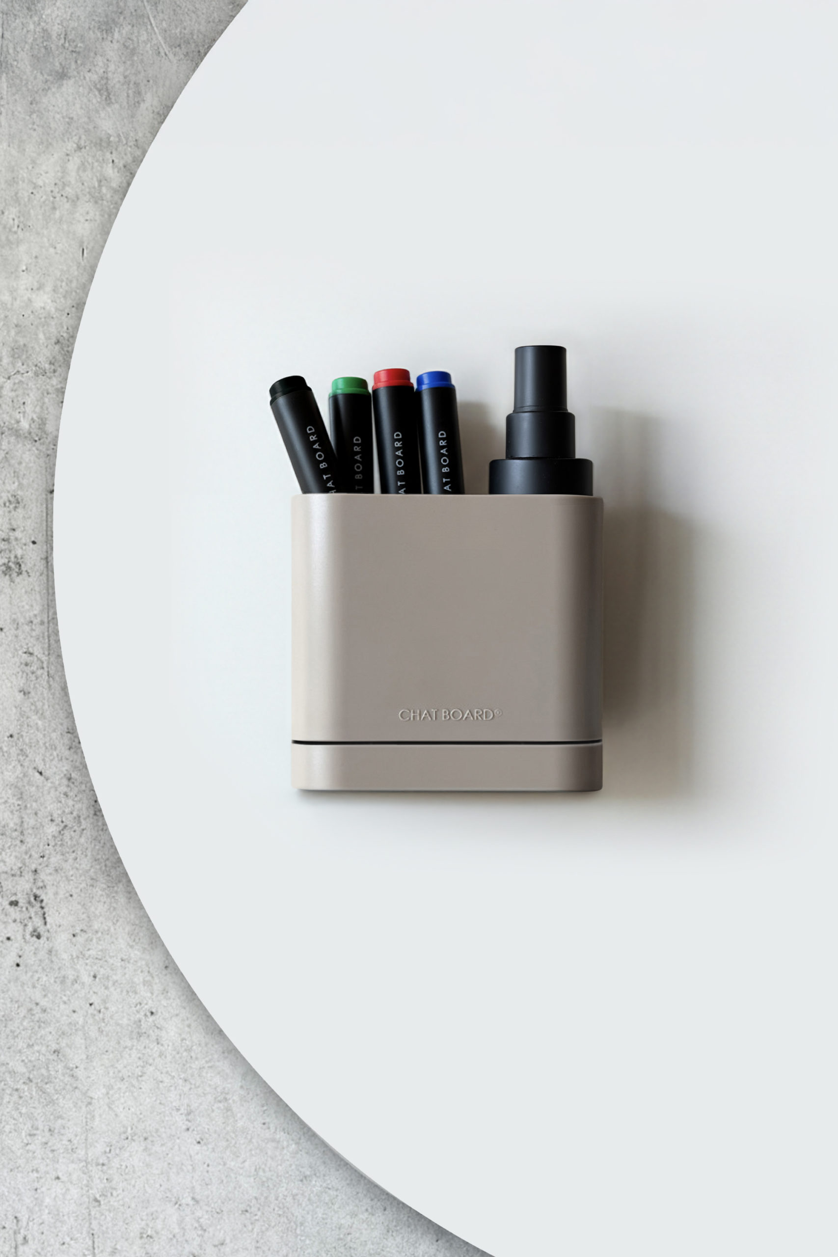 CHAT BOARD Dock storage unit with integrated eraser sponge - in greige, shown on Orbit glass board, and with pens and cleaner spray