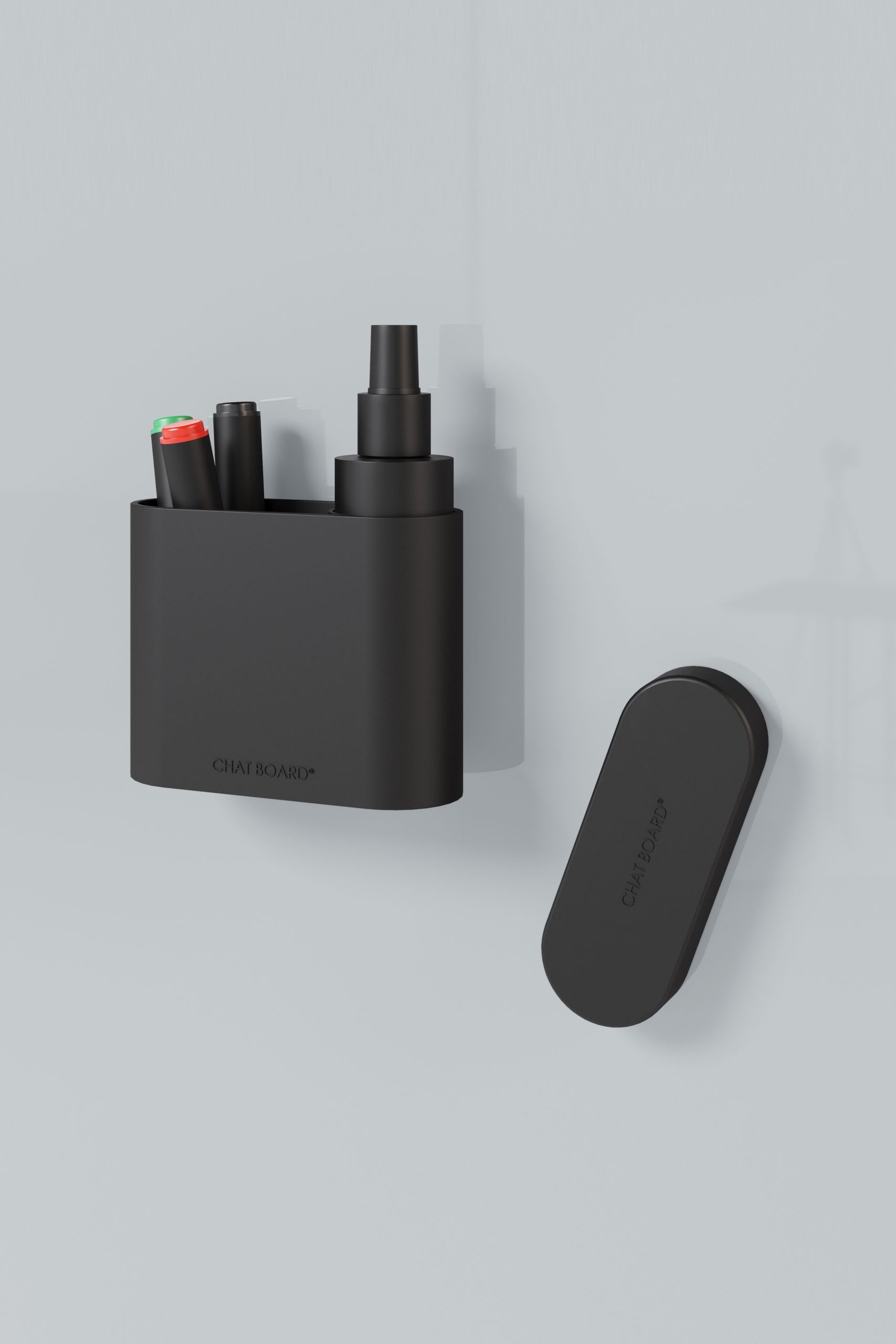 CHAT BOARD Dock storage unit with integrated eraser sponge - in black, shown with pens and cleaner spray - and with the magnetic eraser sponge detached